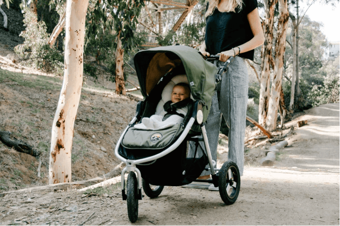 Olive green baby stroller with Bumbleride Organic Cotton Infant Insert for eco-friendly baby strollers