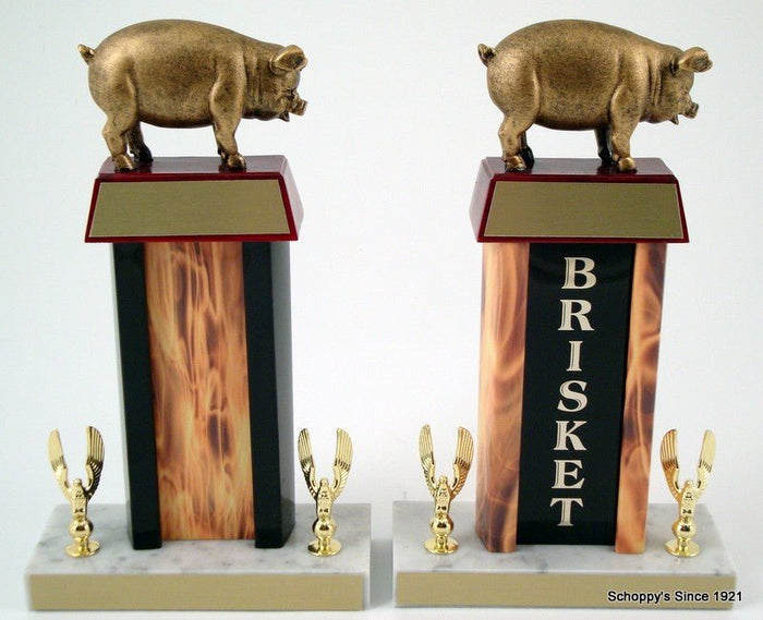 Pig Flaming Column Trophy with a pig resin figure on trapezoid wood base with gold engraving plate, all atop a white marble base that has two golden eagle figures each and gold engraving plates